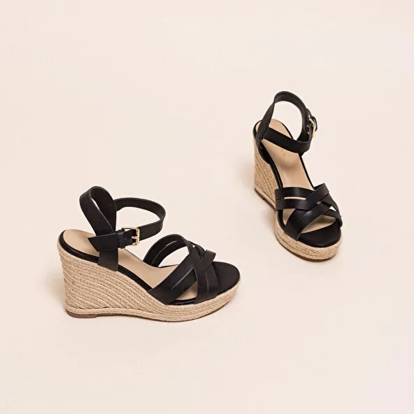 Espadrilles with heel in black leather