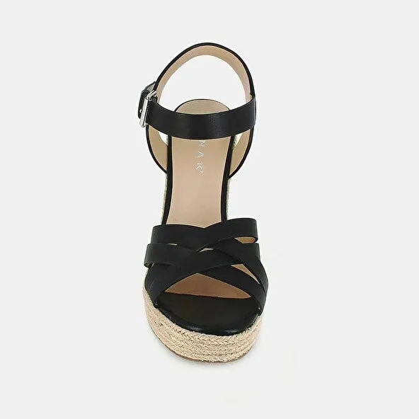 Espadrilles with heel in black leather